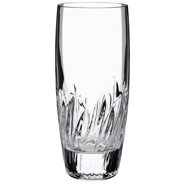 A close-up of a Luigi Bormioli Incanto beverage glass with a curved design.