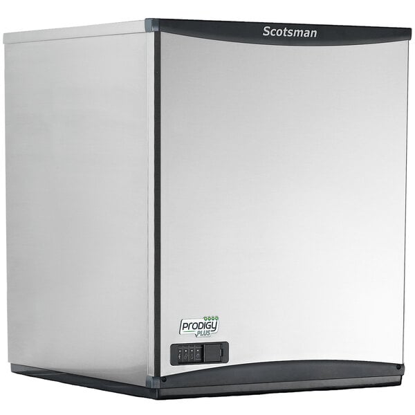 A Scotsman flake ice machine with a white and black exterior.