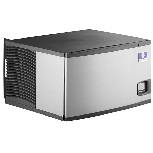 A black and silver Manitowoc air cooled ice machine.