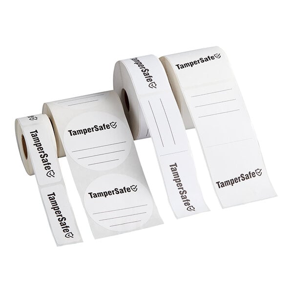 A roll of white TamperSafe labels with black text.