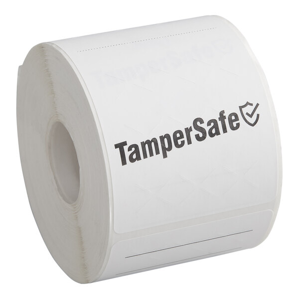 A roll of white TamperSafe paper labels with black text.