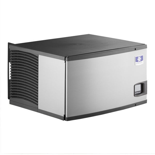A grey and black Manitowoc Indigo NXT air cooled ice cube machine.