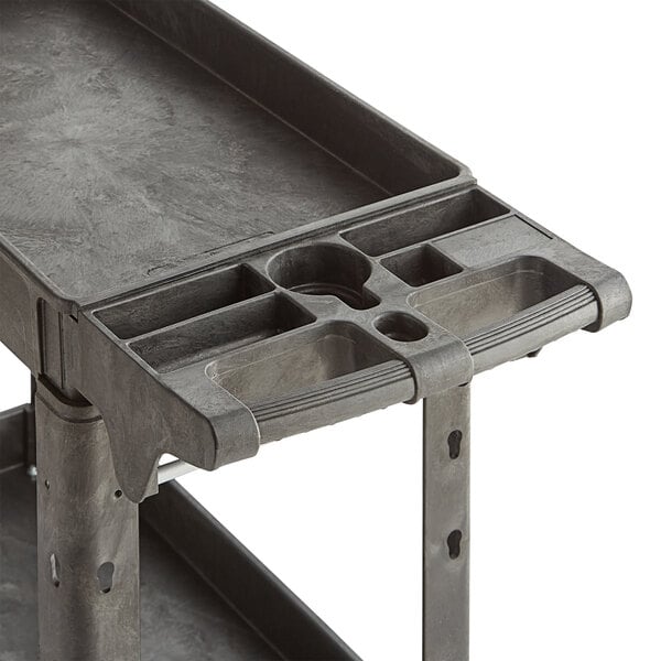 A black plastic utility cart with two shelves and built-in tool compartments.