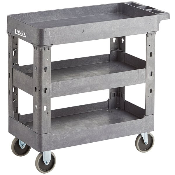 A Lavex medium gray plastic utility cart with three shelves and wheels.