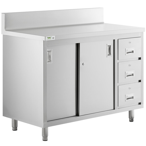 A Regency stainless steel enclosed base table with drawers.