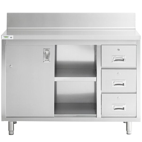 A Regency stainless steel enclosed base table with drawers.