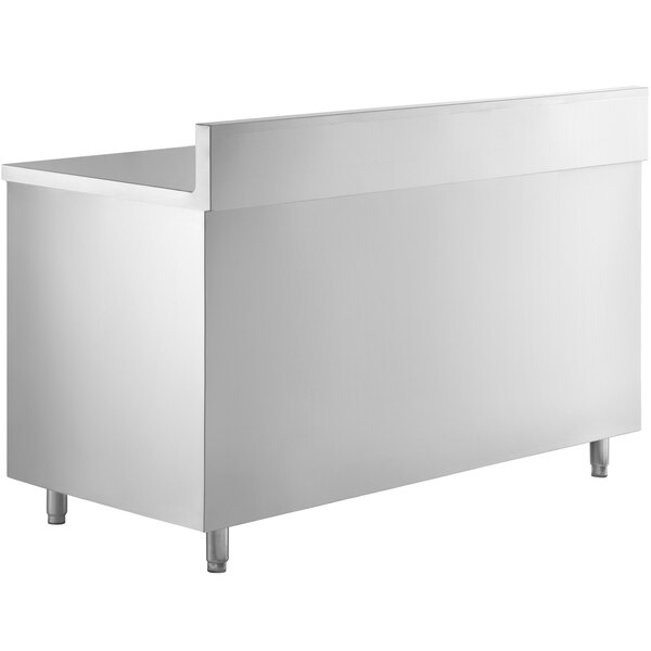A white rectangular stainless steel table with sliding doors and drawers.