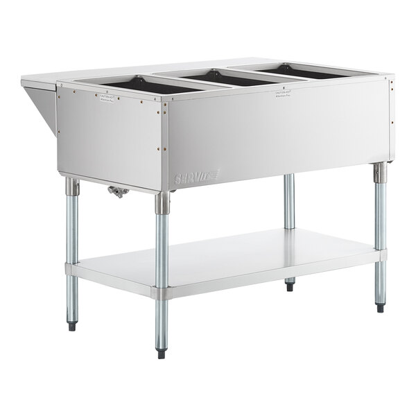 A stainless steel three-pan open well natural gas steam table with an undershelf.