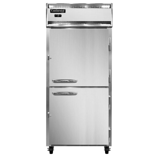 A white Continental Refrigerator reach-in freezer with two half doors.