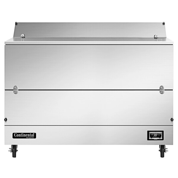 A Continental Refrigerator stainless steel milk cooler with a door open on a counter.