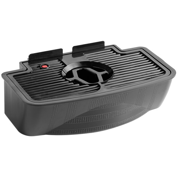 A black plastic container with a red button, the Narvon Drip Tray for SMM Series machines.