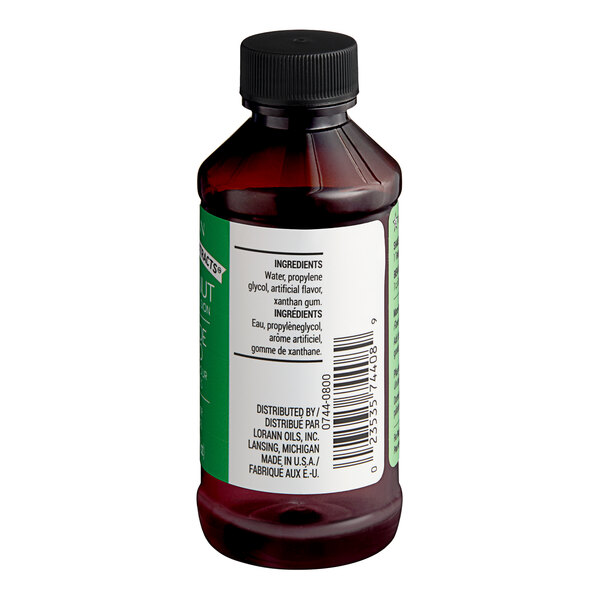 A 4 fl. oz. bottle of LorAnn Oils Coconut Bakery Emulsion with a black cap and ingredient label visible.