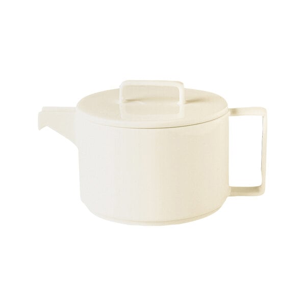 A white RAK Porcelain teapot with a lid.