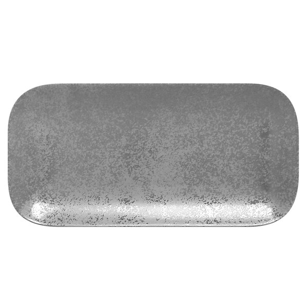 A grey RAK Porcelain rectangular coupe plate with specks on the surface.