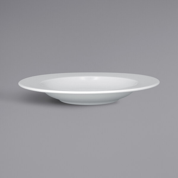 a white plate on a gray background