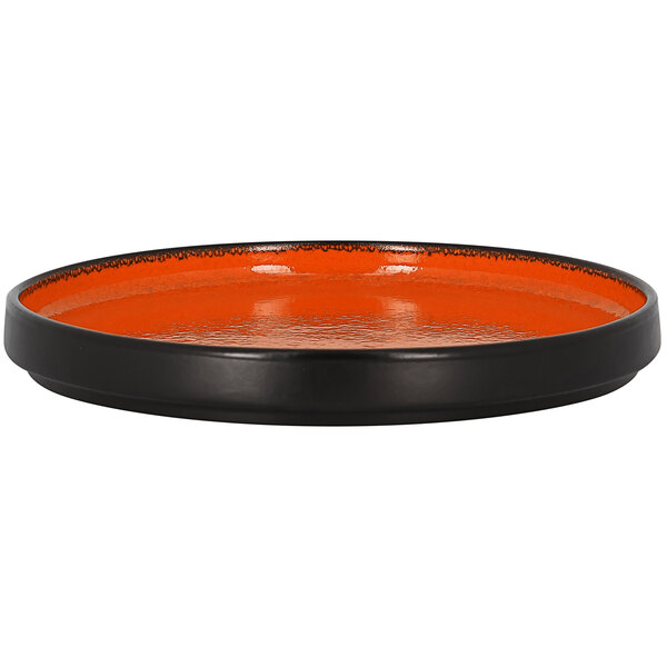 A black and orange RAK Porcelain rimless deep plate.