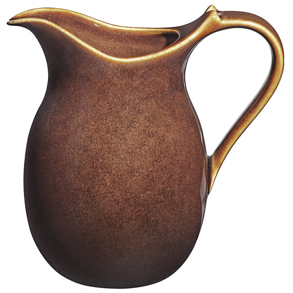 A brown RAK Porcelain Genesis jug with a handle.