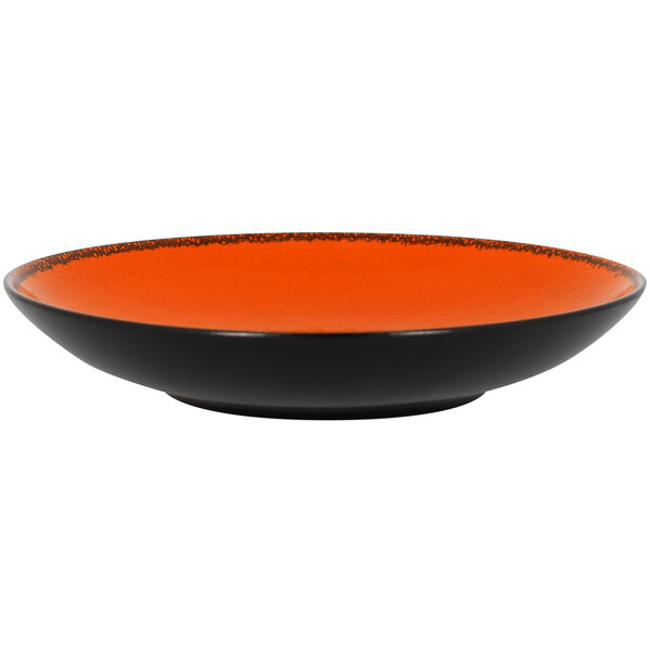 An orange and black RAK Porcelain deep coupe plate.