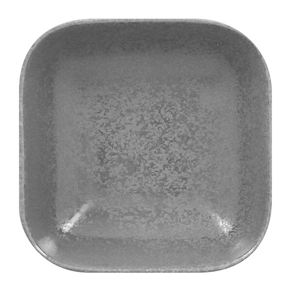 A close-up of a grey square RAK Porcelain dish.