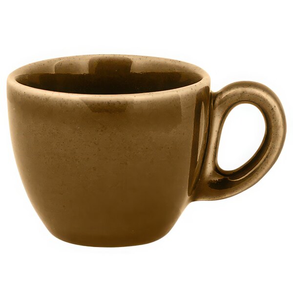 A close-up of the handle of a brown RAK Porcelain espresso cup.