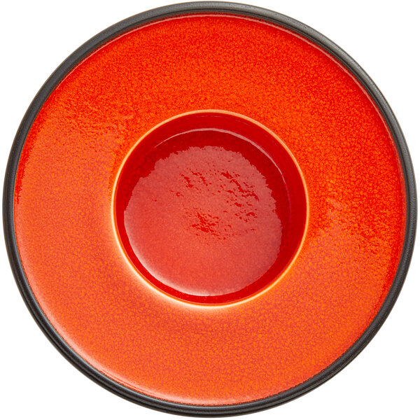 a close up of a red bowl