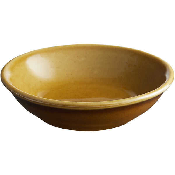 A brown porcelain butter dish with a white background.