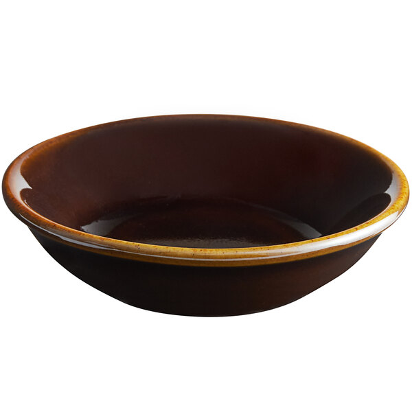 A brown bowl with a white rim.