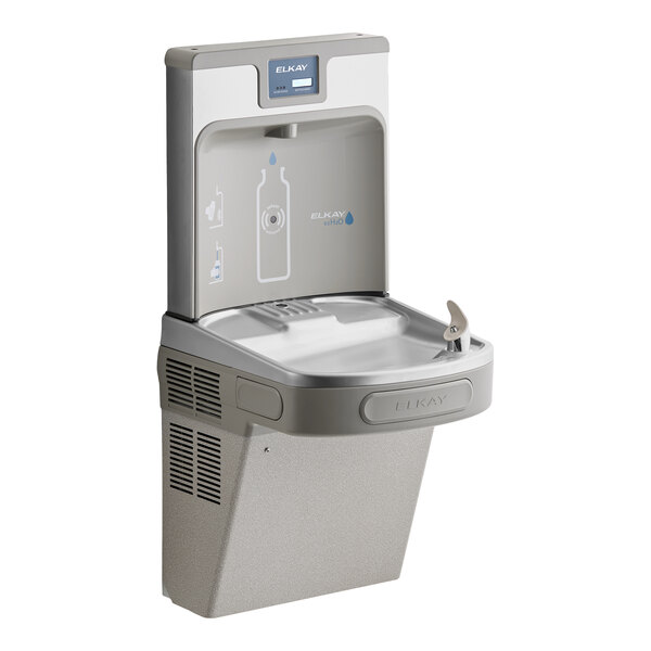 A light gray filtered bottle filling station and water fountain with touchless sensor activation.