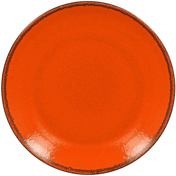 An orange RAK Porcelain coupe plate with a black rim.