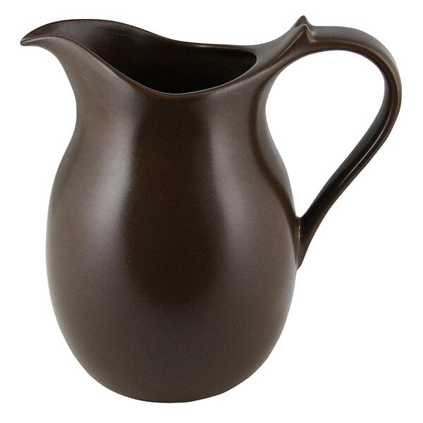 A brown RAK Porcelain Genesis jug with a handle.