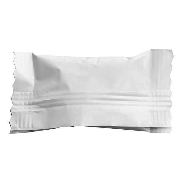 A white plastic bag with a zipper containing white Soft Peppermints.