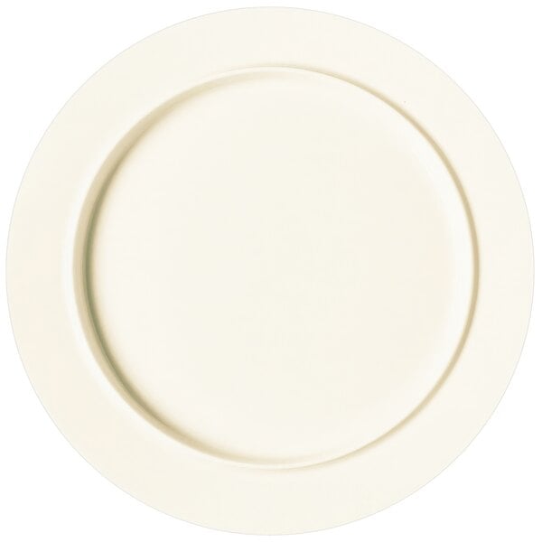 A RAK Porcelain white round flat rimmed porcelain plate.