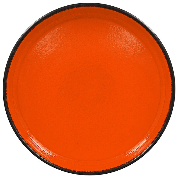 An orange RAK Porcelain deep plate with a black rim.