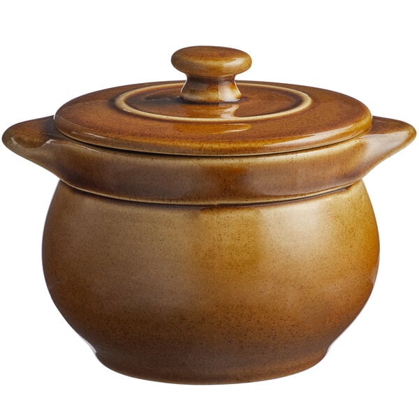 A brown porcelain soup tureen with lid.