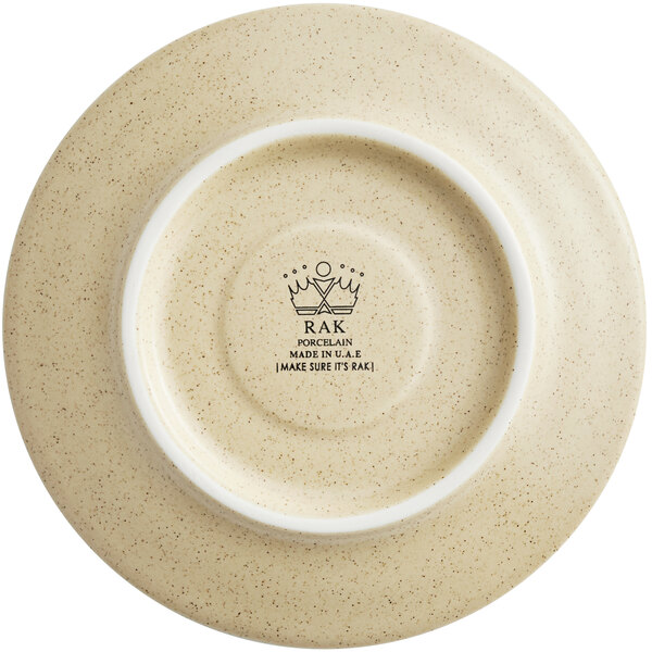 A white porcelain saucer with a white rim.