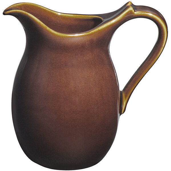 A brown RAK Porcelain Genesis jug with a handle.