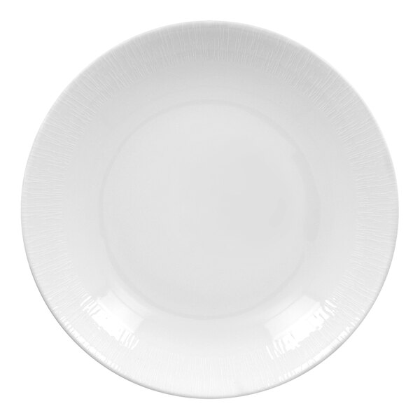 A bright white embossed deep coupe porcelain plate.