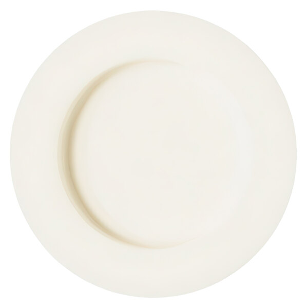 A white RAK Porcelain mini plate with a circular rim.