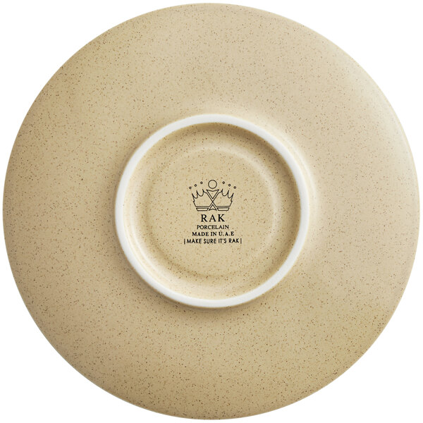 A close-up of a RAK Porcelain Silky Almond porcelain saucer.