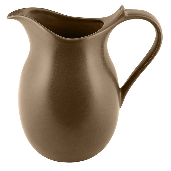 A close-up of a brown RAK Porcelain Genesis jug with a handle.