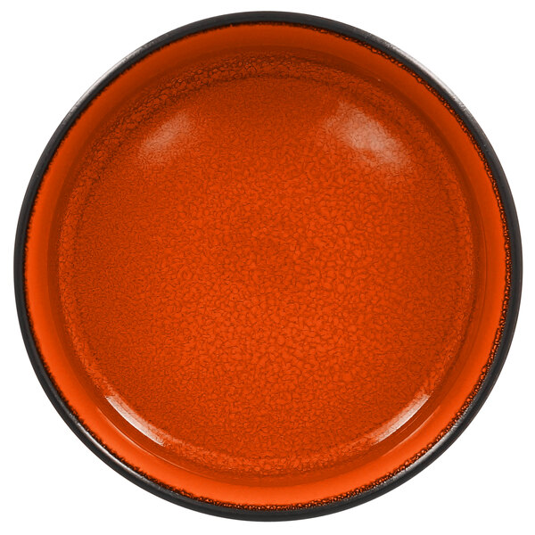 A RAK Porcelain round porcelain bowl with an orange rim and black rim.