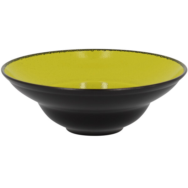 A green porcelain plate with an extra deep rim.