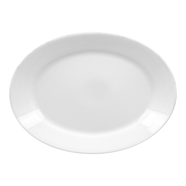 A bright white, embossed oval deep porcelain plate.