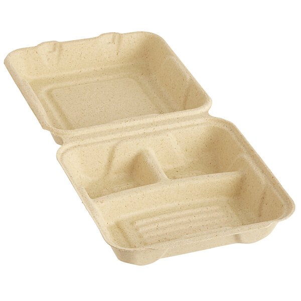 A Fabri-Kal Greenware hinged container with three compartments.