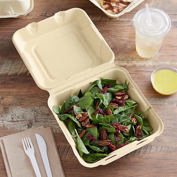 A salad in a Fabri-Kal Greenware plant fiber container.