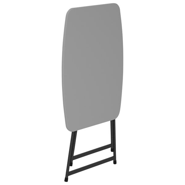 A grey rectangular Bridgeport Essentials folding table with black legs.