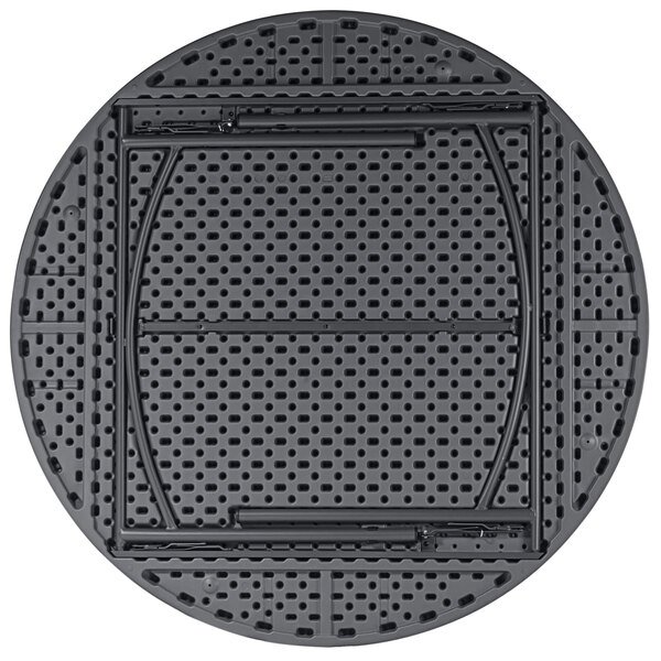 A gray ZOWN round resin table top with holes.