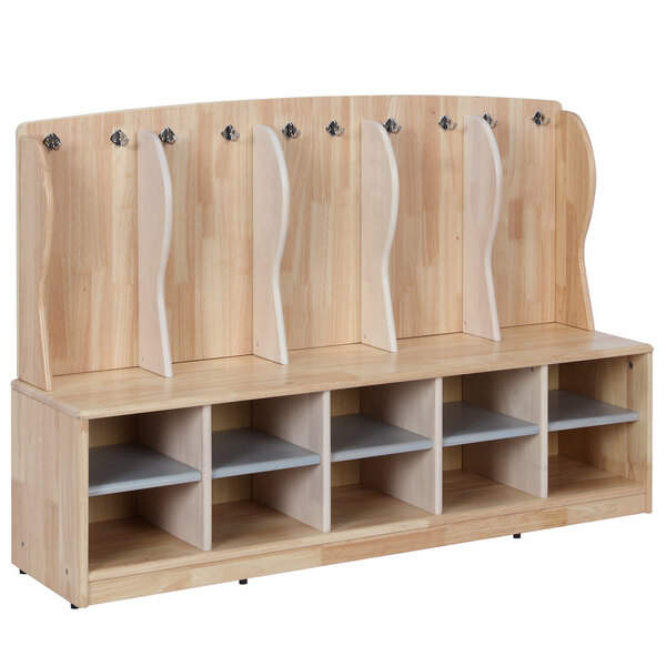 A wooden Bridgeport cubby locker with shelves and hooks.