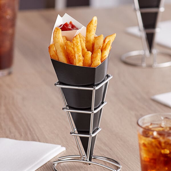 A black Carnival King cardboard fry cone filled with French fries.