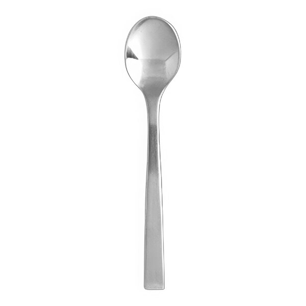 A close-up of a Fortessa stainless steel demitasse spoon with a long handle.